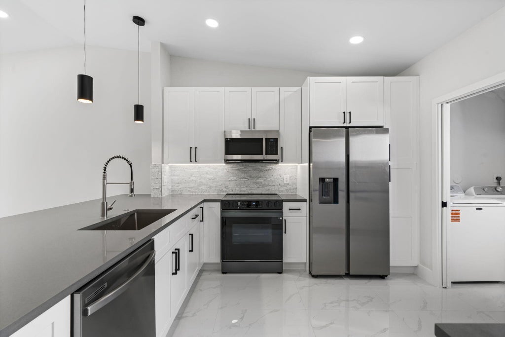 Photo of 6092 Kings Gate Circle, Delray Beach, FL 33484 (MLS # R11062979)