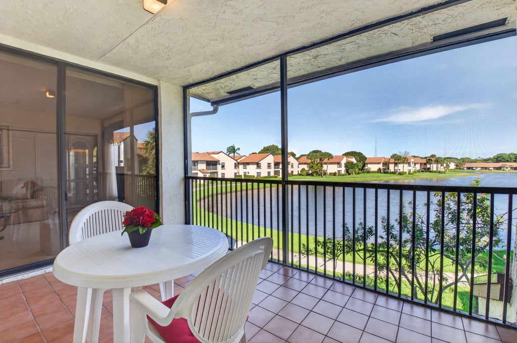 Photo of 8609 BOCA GLADES Boulevard W #H, Boca Raton, FL 33434 (MLS # B26092932)