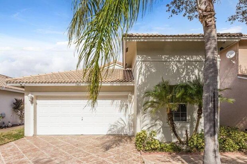 Photo of 3863 NW 63rd Court, Coconut Creek, FL 33073 (MLS # R10691605)
