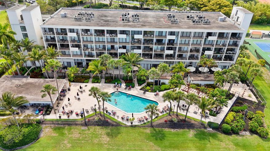 Incredibly unique ground-floor walkout loft condo featuring a private fenced terrace just steps from the pool. Perfect as a personal getaway or investment opportunity with flexible rental terms—up to 12 times per year (monthly minimum). Offered fully furnished and turnkey, so you can start enjoying the South Florida lifestyle from day one. Lakeshore Club is a gated community with an on-site manager, heated lakeside pool, and an unbeatable central location in West Palm Beach—just minutes to downtown, major highways, shopping, dining, and Palm Beach International Airport.