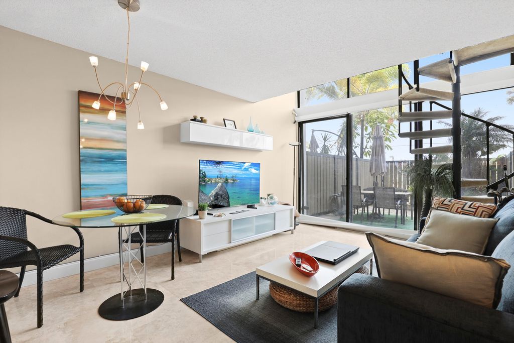 Photo of 1830 Embassy Drive #122, West Palm Beach, FL 33401 (MLS # B26016096)