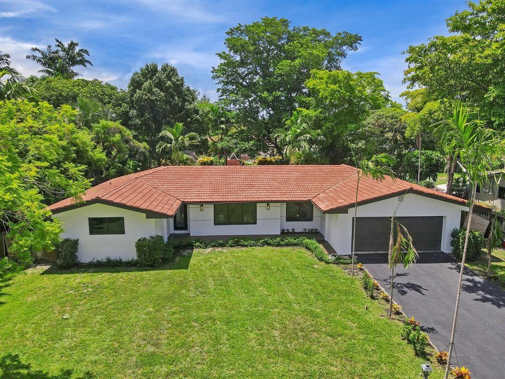 Beautiful home with large front and backyard. This is a true Gem ! Gorgeous 3/2 home plus a bonus room/office and 2 car garage. Backyard is fenced and has lots of room for a pool or outside entertaining. Look at these stunning floors. Living room with fireplace open floorplan to kitchen. Updated kitchen and bathrooms. Hurricane impact exterior doors and windows. This desired community has no HOA. Bring your boat or RV. Centrally located in the heart of Plantation. Close to schools, parks, golf courses, shopping, dining and more. Please read broker remarks for important info.