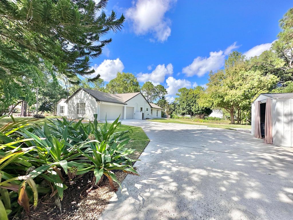 Photo of 13465 88th Place N, West Palm Beach, FL 33412 (MLS # R10936468)