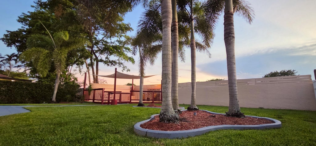 Photo of 198 NW 48th Avenue, Deerfield Beach, FL 33442 (MLS # B26044208)