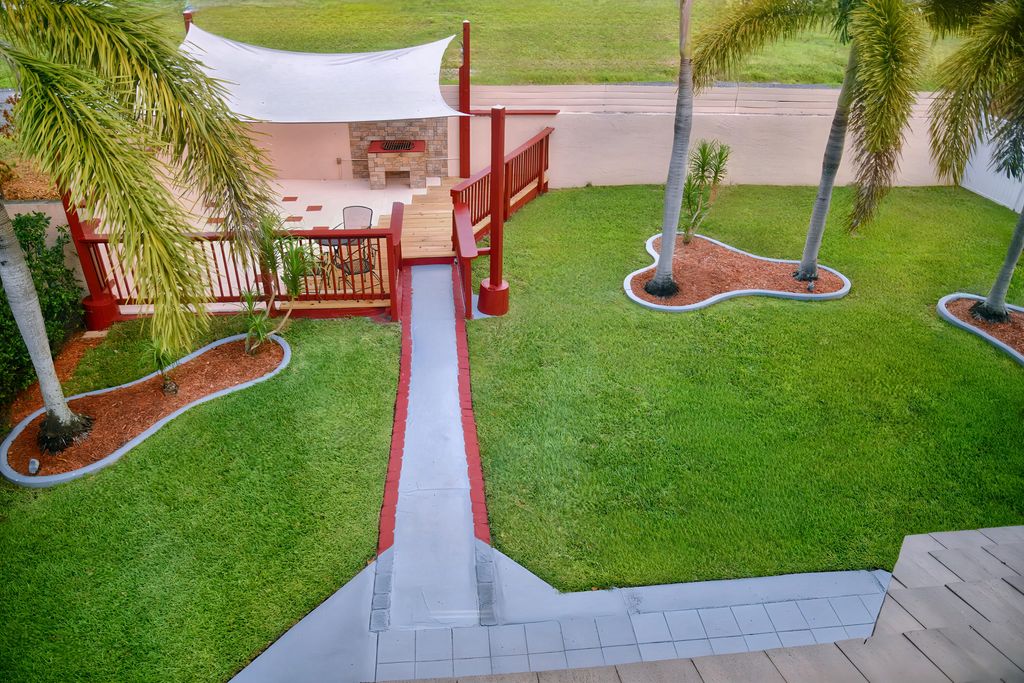 Photo of 198 NW 48th Avenue, Deerfield Beach, FL 33442 (MLS # B26044208)