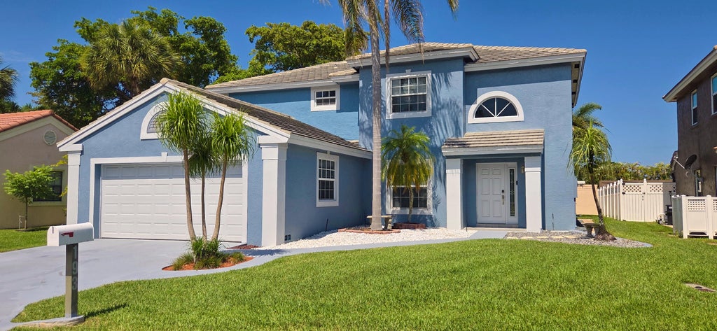 Photo of 198 NW 48th Avenue, Deerfield Beach, FL 33442 (MLS # B26044208)
