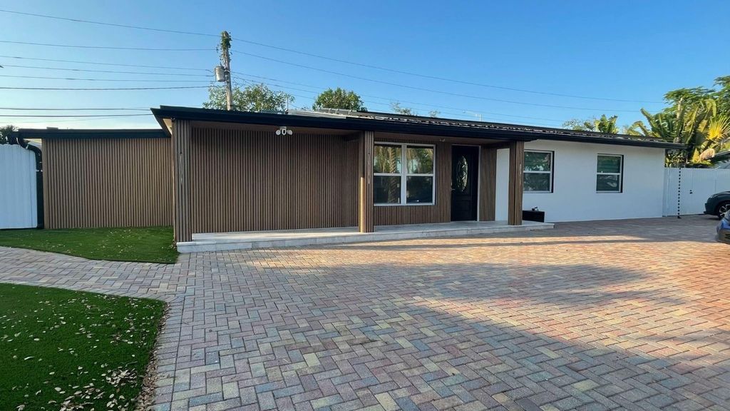 Photo of 1031 NW 49th Street, Fort Lauderdale, FL 33309 (MLS # F10543930)