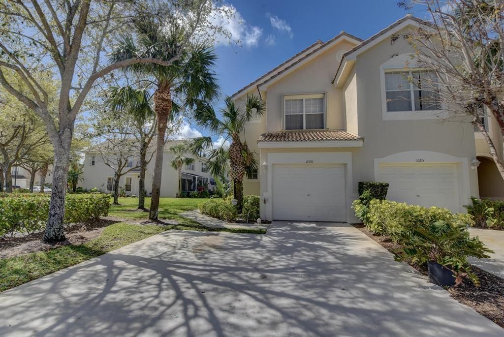 Photo of 1086 Woodfield Road, Greenacres, FL 33415 (MLS # B26021098)