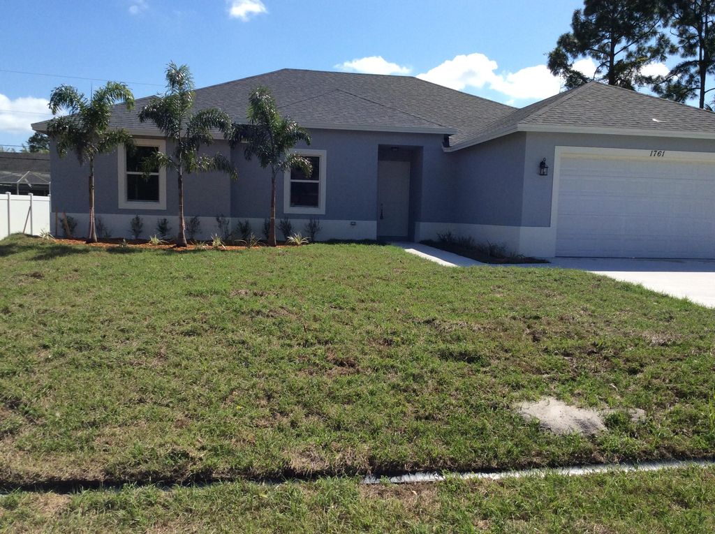 Photo of 549 SW Feldman Avenue, Port Saint Lucie, FL 34953 (MLS # R10784872)