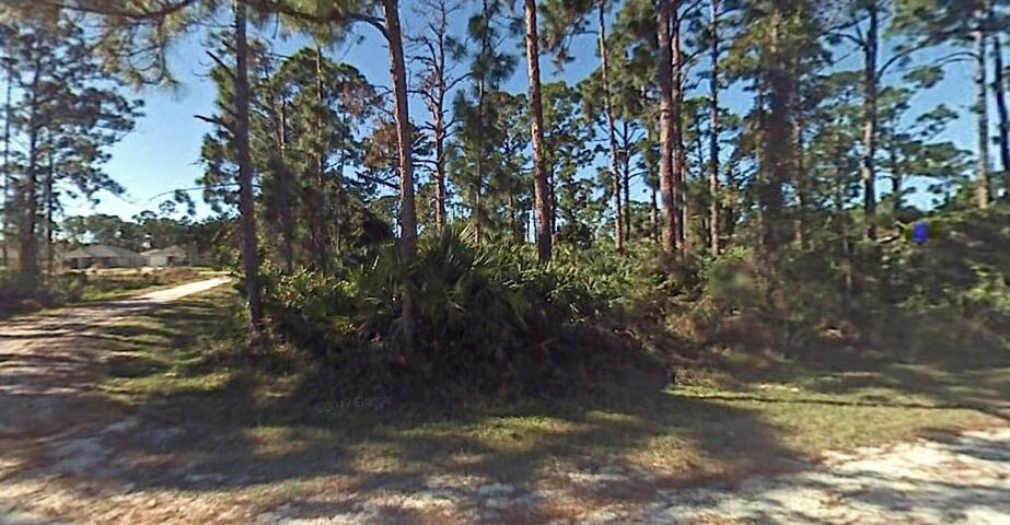 Great opportunity to build your dream home on a beautiful corner lot in quaint neighborhood of Vero Beach!