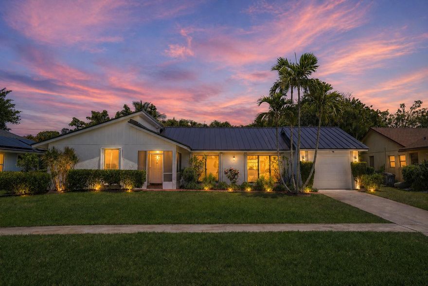 Come see this COMPLETELY REMODELED 2 bedroom PLUS OFFICE, 3 FULL BATH home w/ SOARING CATHEDRAL CEILINGS, NEW METAL ROOF (2026) and coastal style PORCELAIN TILE FLOORING THROUGHOUT!  The open concept floor plan gives a very light bright and open feeling w/ lots of NATURAL LIGHT streaming through.  The kitchen features, QUARTZ COUNTERTOPS & a 10 ft QUARTZ ISLAND (room for 6 barstools!)  The Primary bath features a white shaker vanity w/ QUARTZ countertop & the contemporary shower looks like right off HGTV.  The guest bath was also beautifully updated.  The BONUS OFFICE area features a cute gem of a FULL BATH too!  Relax on the brick paver patio to grill out w/ friends or catch some rays in your own very PRIVATE backyard!  Coco Wood Lakes is a quiet 55+ community in the heart of Delray!
