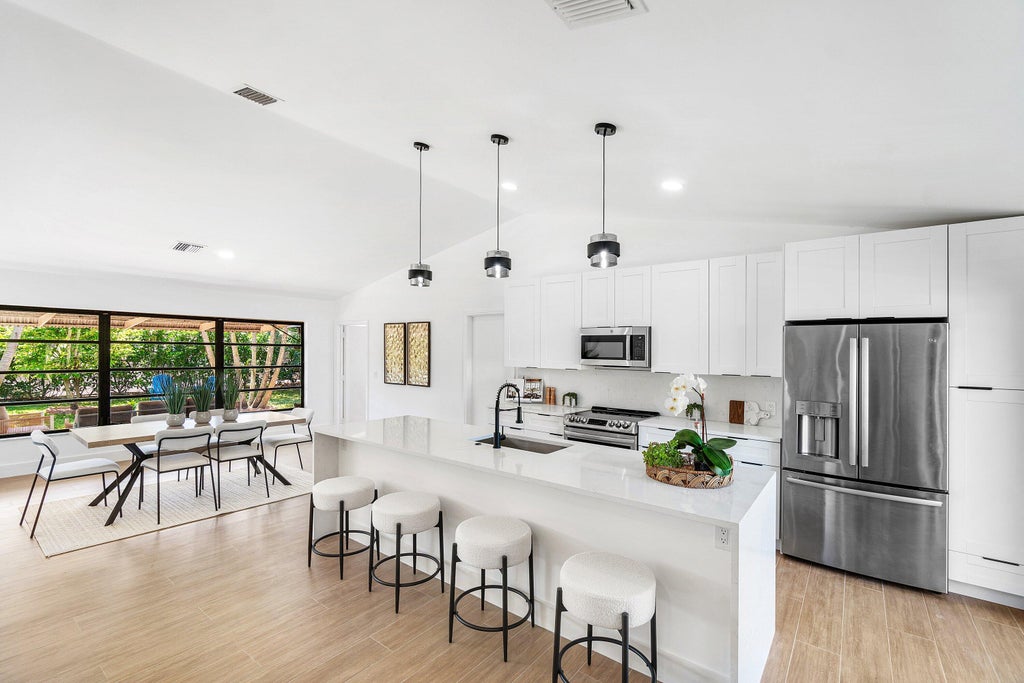 Photo of 14888 Sunnyview Lane, Delray Beach, FL 33484 (MLS # B26020445)