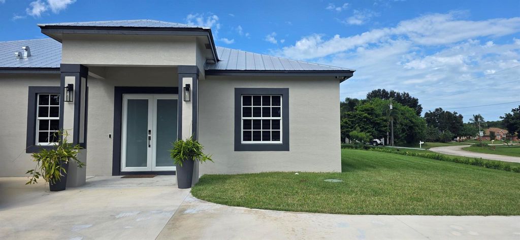 Photo of 196 SW Paar Drive, Port Saint Lucie, FL 34953 (MLS # R11131501)