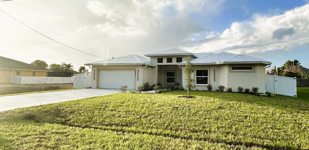 Photo of 2233 SW Elmwood Avenue, Port Saint Lucie, FL 34953 (MLS # B26030077)
