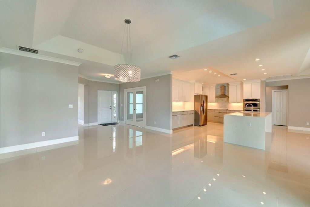 Photo of 2233 SW Elmwood Avenue, Port Saint Lucie, FL 34953 (MLS # B26030077)