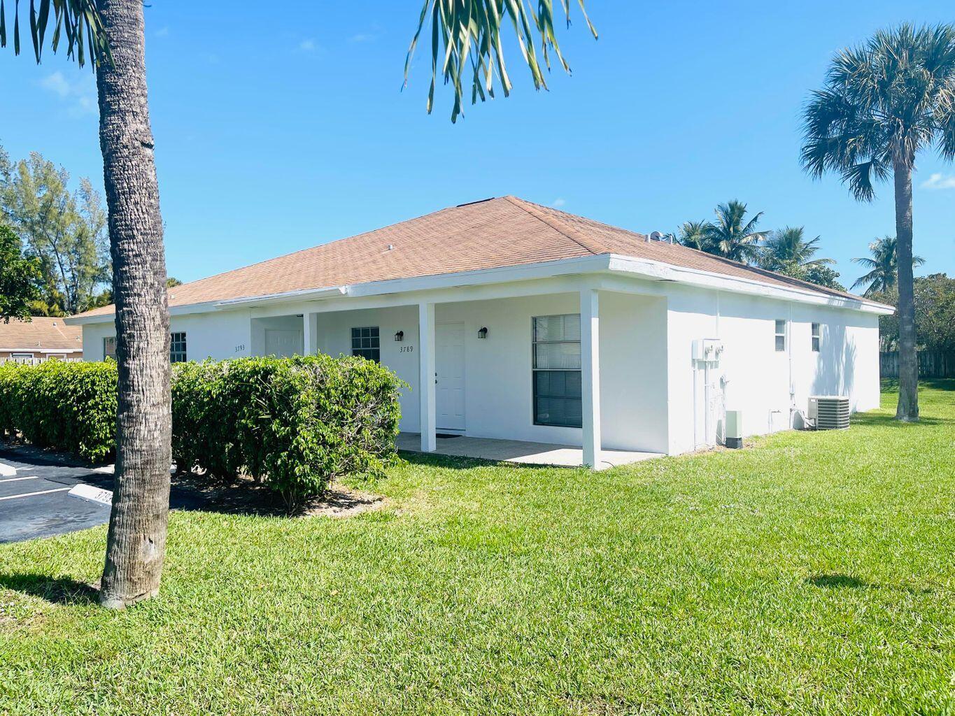 FREE FIRST MONTH! Completely Renovated villa with 2 bedrooms & 2 beautifully renovated bathrooms. Brand new kitchen with white shaker custom cabinetry, plank flooring, brand new appliances, new bathrooms with custom vanities, new fixtures, all freshly painted thru out. The biggest unit available for the price. Come today! Located near Northlake Blvd, close to beaches, shopping, restaurants, easy access to 95, only 10 minutes north of downtown West Palm Beach. 85/month pest control & common area maintenance fee additional. $145 lease transaction fee.
