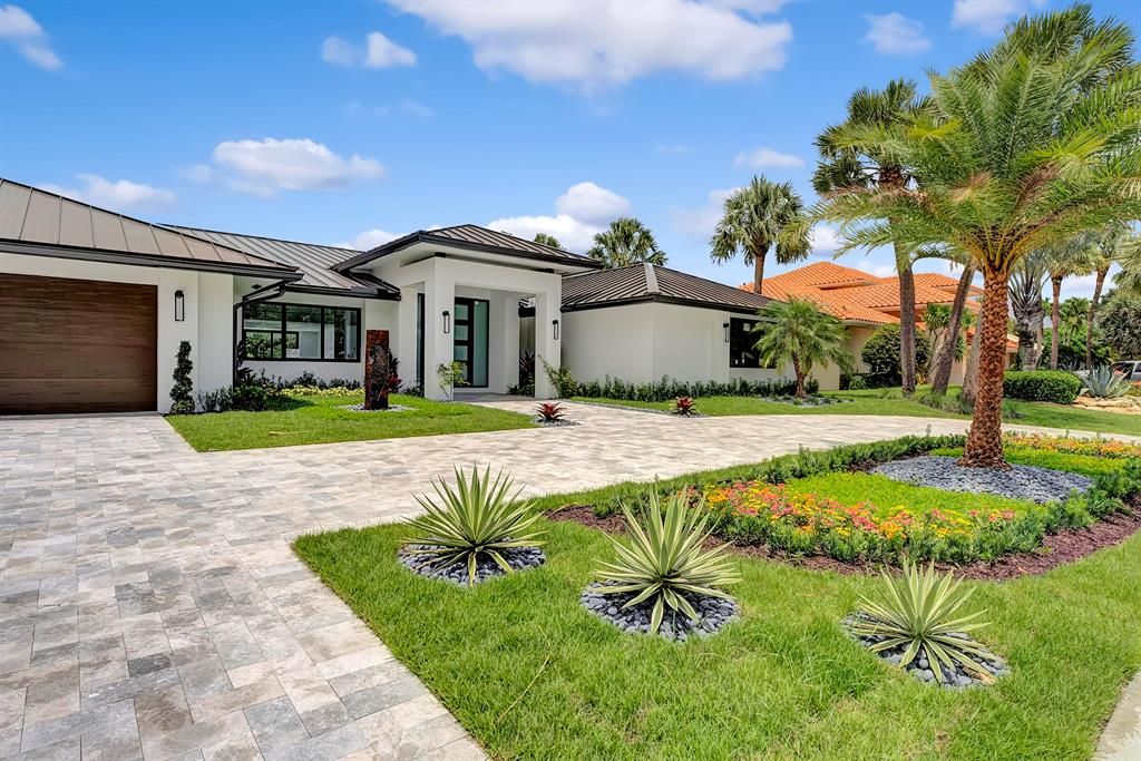 Photo of 4027 Live Oak Boulevard, Delray Beach, FL 33445 (MLS # R10896247)