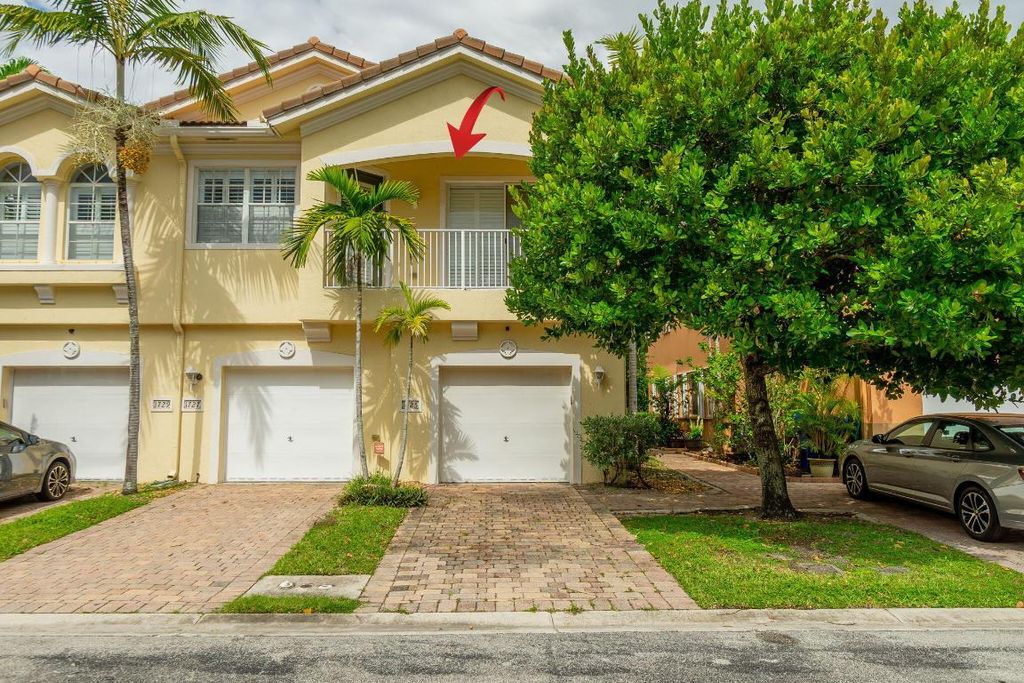 Photo of 1725 Terra Cotta Drive, Riviera Beach, FL 33404 (MLS # R11134652)
