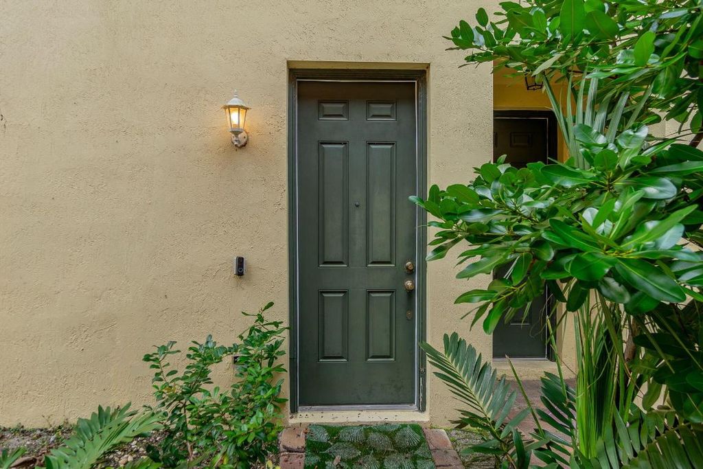 Photo of 1725 Terra Cotta Drive, Riviera Beach, FL 33404 (MLS # R11134652)