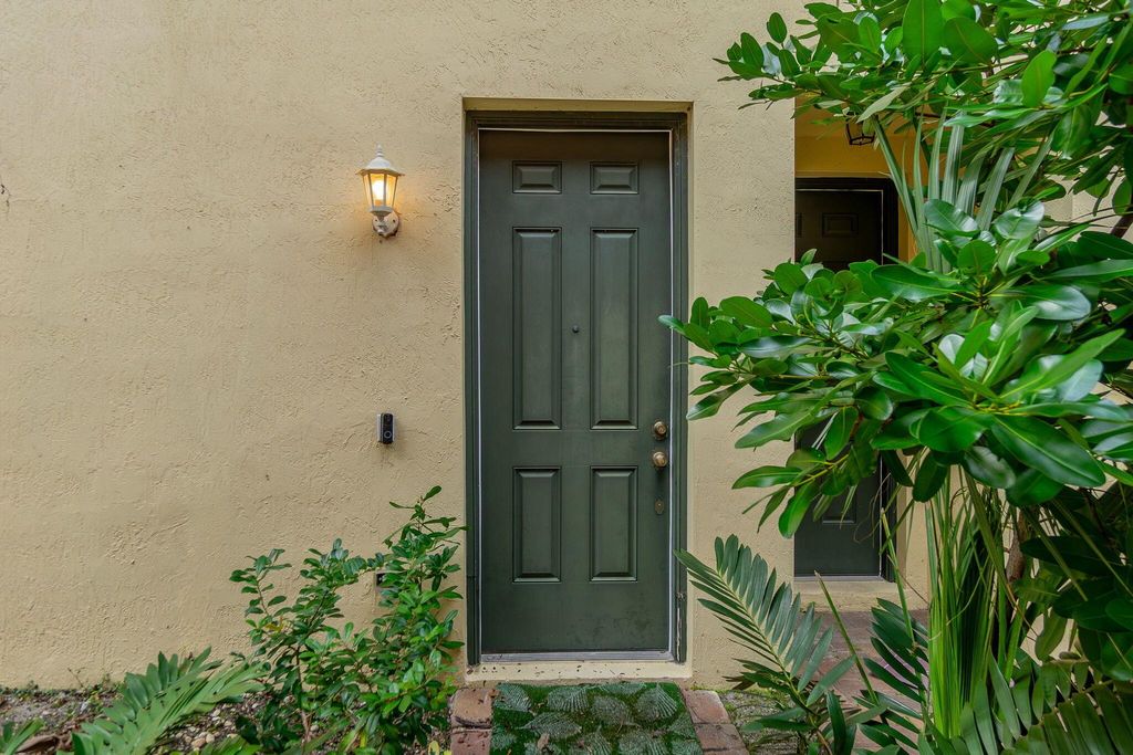 Photo of 1725 Terra Cotta Drive, Riviera Beach, FL 33404 (MLS # R11134652)