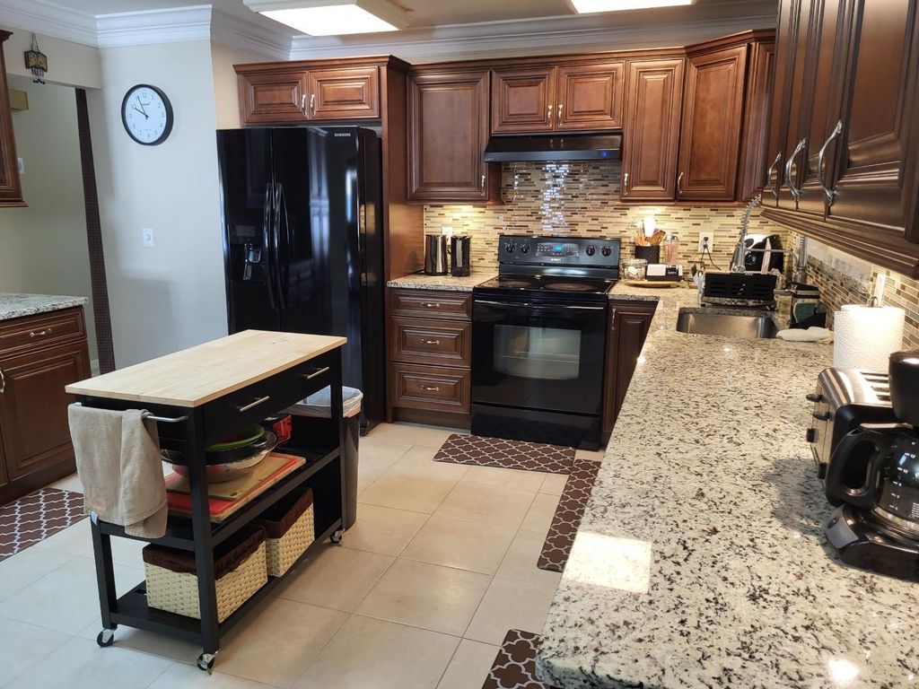 Photo of 702 SW Belmont Circle, Port Saint Lucie, FL 34953 (MLS # F10508891)