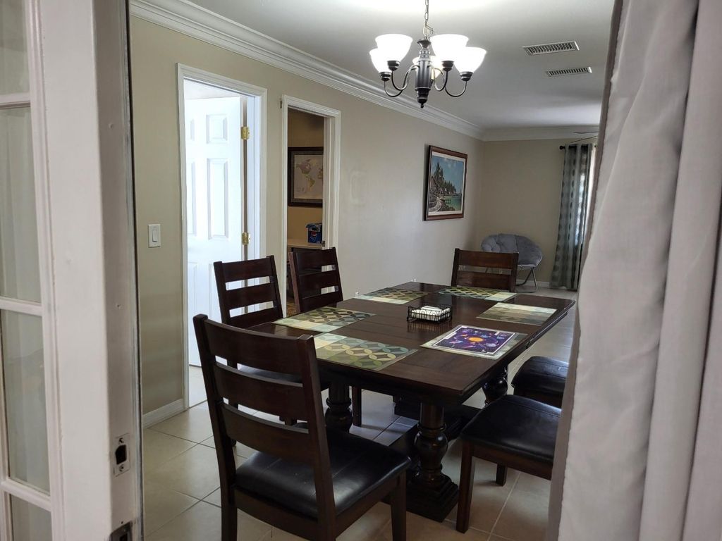 Photo of 702 SW Belmont Circle, Port Saint Lucie, FL 34953 (MLS # F10508891)