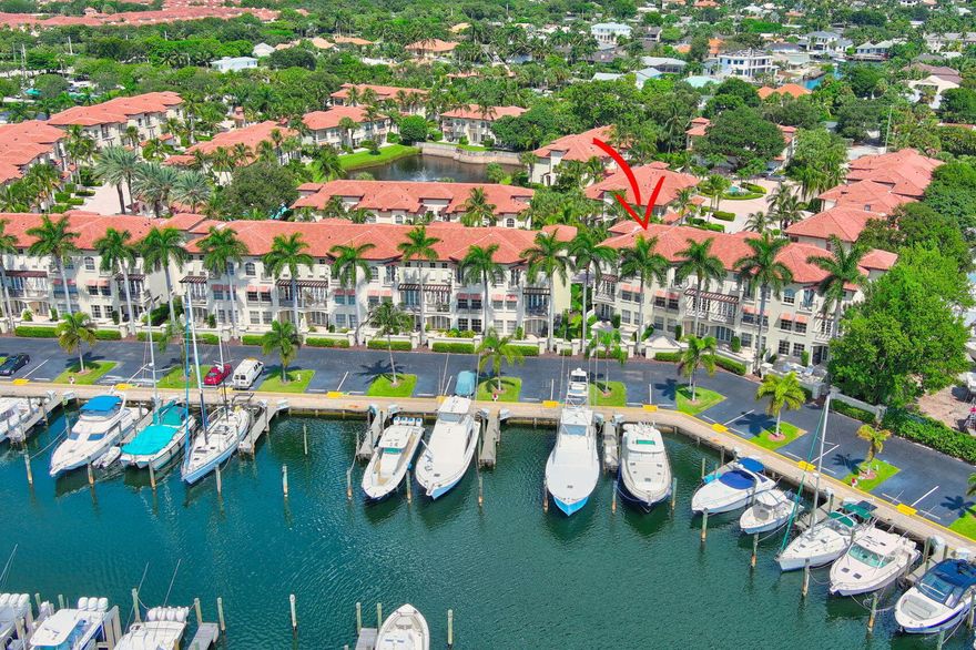 Highly Desirable 3 Story Renovated Waterfront Corner Townhouse Offering 4 Bedrooms, 4.5 Baths, Private Elevator & 2-Car Garage, Located in the Exclusive Gated Community of Marina Gardens on Soverel Harbour Marina. Includes an Opportunity to Purchase A 45' Boat Slip Separately—Perfect For The Avid Boater. This Light-Filled Residence Showcases Exceptional Design & Refined Finishes Throughout. 1st Floor Features a Spacious Guest Suite w/Full Bath, &  Family Room w/Built-In Wet Bar, Opens to an Oversized Patio Overlooking the Marina. 2nd Level has Expansive Living & Dining Area w/Water Views, Open Expanded Kitchen w/Natural Gas 5 Burner Cooktop, Double Ovens, Large Center Island & Built-in Desk. 2nd Guest Ensuite/Office. 3rd Floor has an Elegant Primary Suite w/Spa-Like Bath, Soaking Tub... Separate Shower, Dual Vanities w/Extensive Cabinetry & Private Water Closet. Plus an Additional Spacious 3rd En-Suite Bedroom. Additional Upgrades Include Impact Windows & Doors Throughout, 10ft Ceilings & Solid Wood Doors Throughout, Saturnia Marble & Wood Floors, Crown Molding, Tray Ceilings, Built-Ins in all Closets,  All Bedrooms & Dining Room Enjoy Access to Private Balconies, Enhancing the Home's Exceptional Waterfront Lifestyle.  Close to Fine Dining, Shopping, Gardens Mall, Beaches, Golf & Airport.  Walk to Carmines & the River House.  Prime Location!!