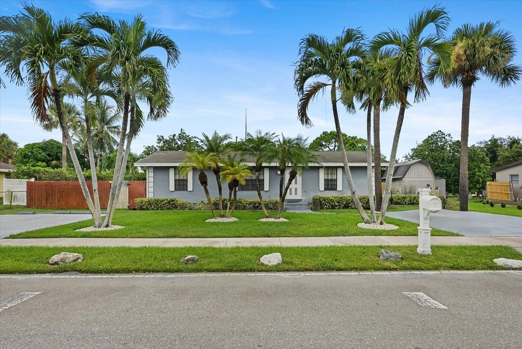 Photo of 1705 Boardman Avenue, Mangonia Park, FL 33407 (MLS # R11113494)