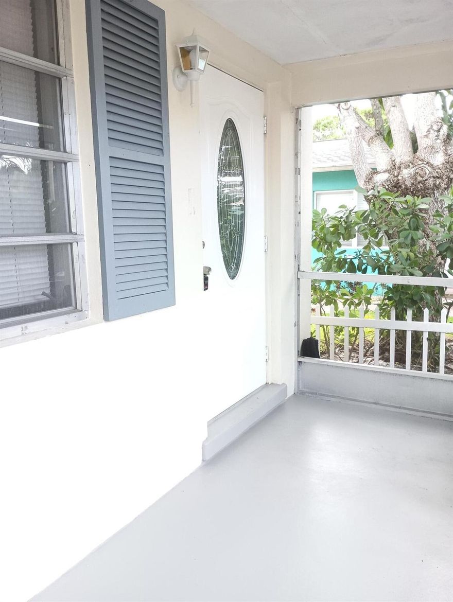 Spacious three bedroom two bath home with screen patio in front of house. Home has been recently painted,with new wood like flooring, fans, lighting, blinds,. the kitchen has lots of cabinets  for added storage. Washer and dryer with a separate storage building in back of house. A private fenced back yard,with parking in back area of home. Centrally located, close to shopping and restaurants this home is ready for move in.