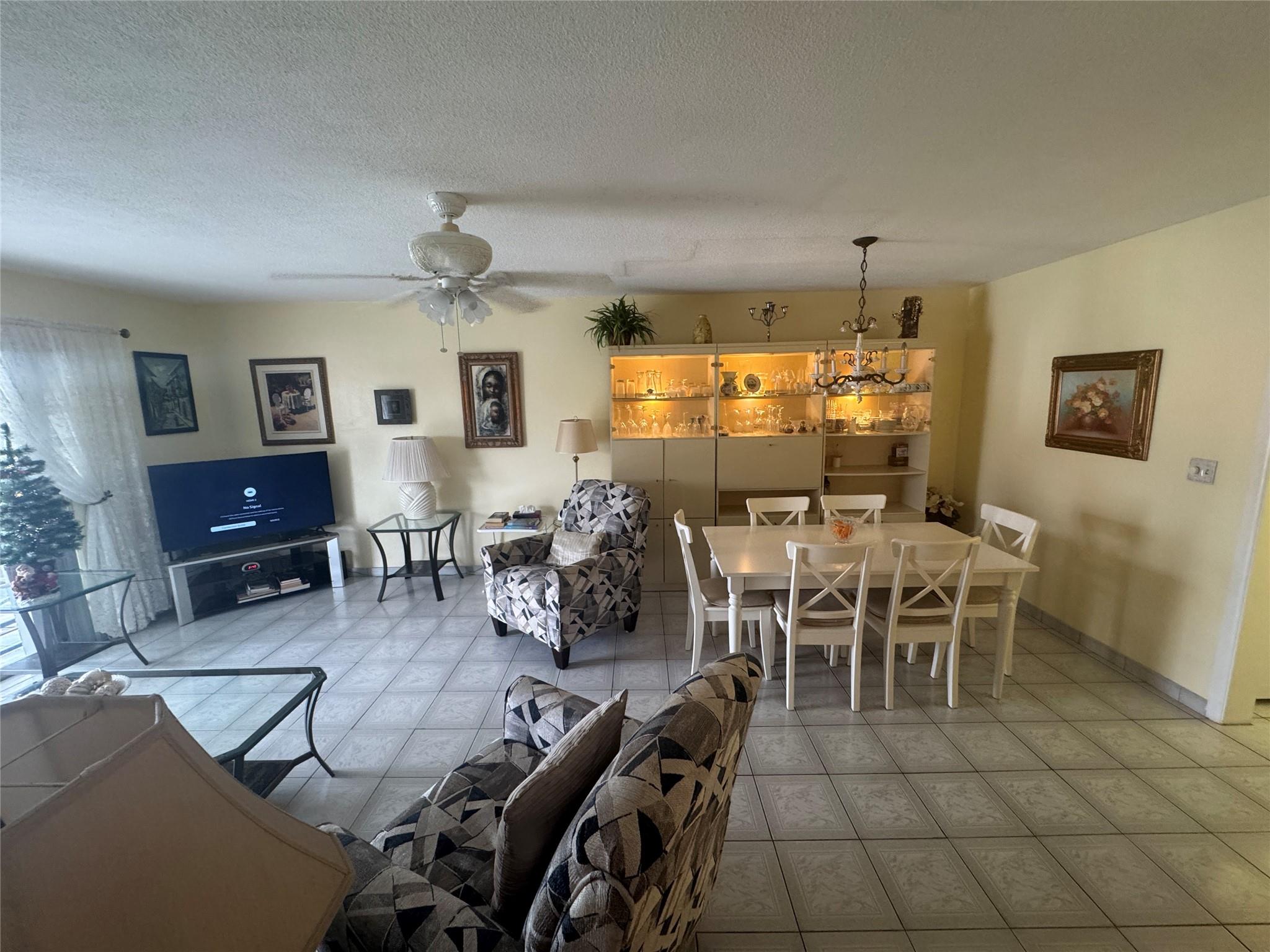 Wow, DELUXE MODEL (LARGEST) 1 bedroom and 1 bathroom in building #1 of gated community "Mar-Len Gardens". Deluxe model has 883 square feet plus screened in balcony. Bright,& airy plus more space! Tiled floors throughout. newer kitchen cabinets including dishwasher. Bathroom Vanity, Medicine chest and toilette have been replaced. Nice Living Room Furniture is 1 year oldHopa (55+) Community with lots of activities available. This COOP has a land lease with 41 years remaining on the lease. Cash only, No Rentals during your 1st year of ownership. after you can rent once a year for a max of 4 months, This gated community has 2 pools, clubhouse, gym, library, card room, shuffleboard, Boccie, etc. Close to shops, airports, restaurants, shopping, malls, casinos, etc. Only 3 miles to the beach.