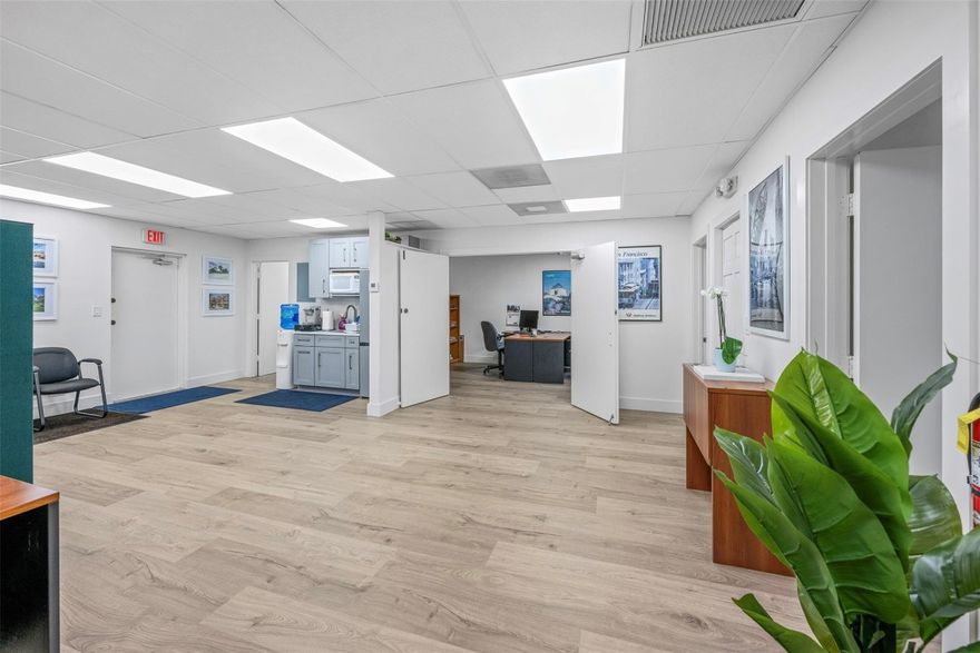Recently updated with clean bright LED lighting and white on white finishes. Open flexible floor plan design can accommodate 5 private offices.