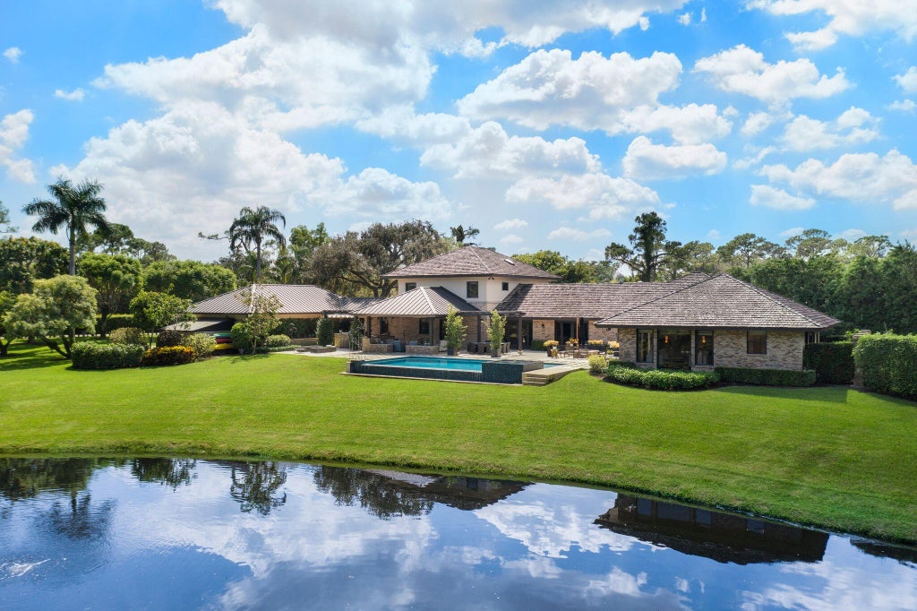 Photo of 3 PEACOCK Lane, Village Of Golf, FL 33436 (MLS # B26081785)
