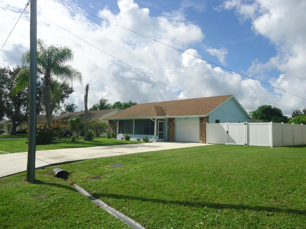 Photo of 2206 SE Carnation Road, Port St Lucie, FL 34952 (MLS # R10867173)