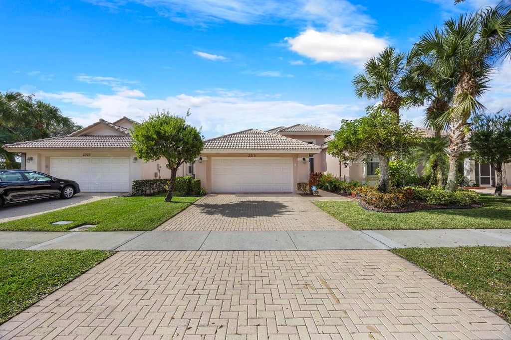Photo of 2315 Sailfish Cove Dr, West Palm Beach, FL 33411 (MLS # R11153355)
