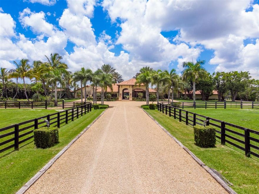 Wellingtons Finest!! This nearly 11.5 acre equestrian estate is nestled in the heart of Wellington close to all world class horse show & polo venues. Not to be rivaled this estate has an 18 stall stable, 3 bedroom staff quarters, office, spectacular tack room, lounge, large gazebo overlooking the arena and grass jump field. The 140' X 330' jumping arena is complimented by an adjacent large grass jump field with natural obstacles. This is truly an equestrian oasis! The property is also being offered in separate parcels of 11.36 acres and 21.14 (RX-10655077) acres respectively. This is a must see property for the serious equestrian.