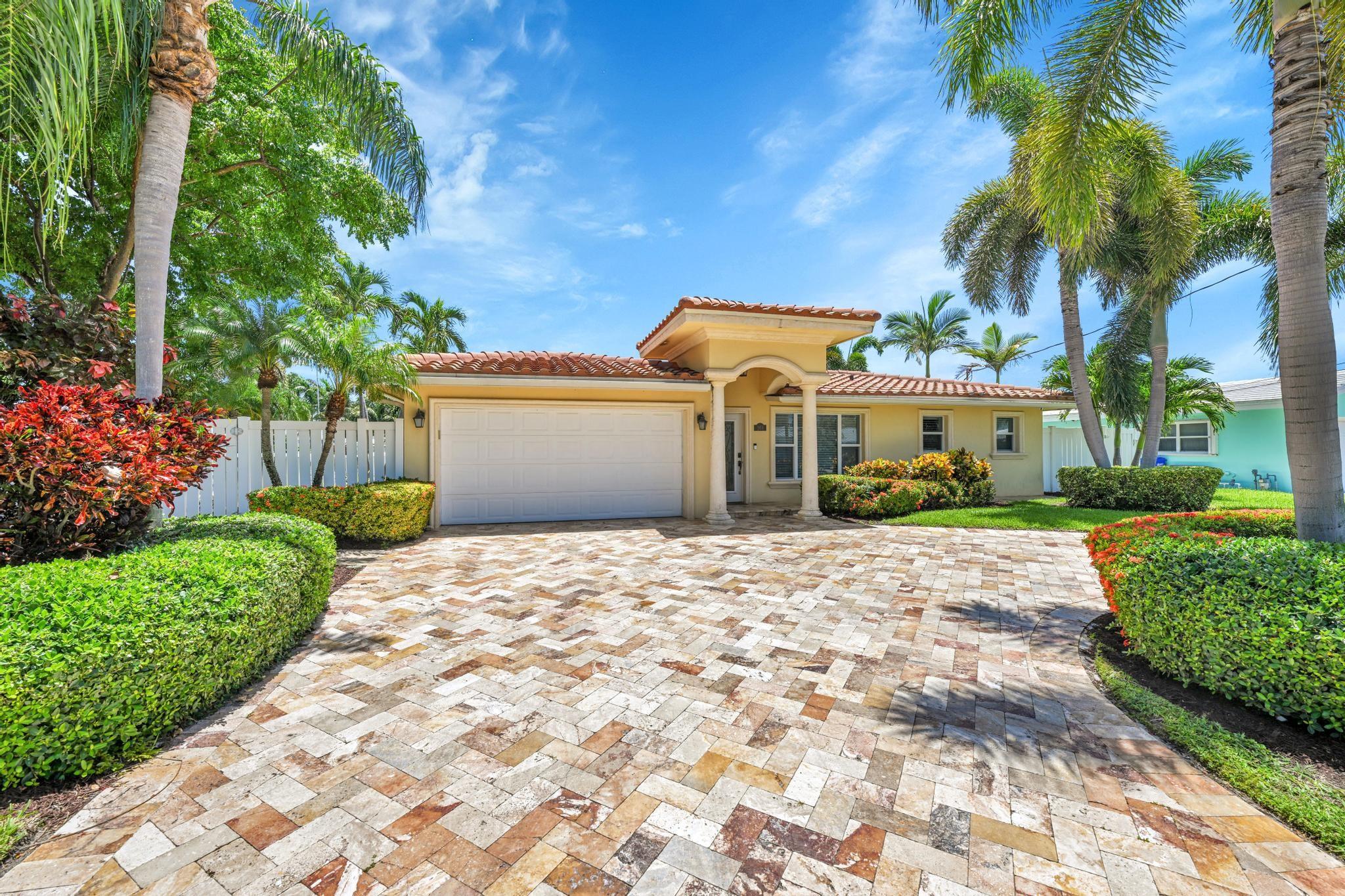 You are going to want to see this one!! This Gorgeous 3BD 3BTH pool home in Garden Isles was recently renovated with custom expansion to the interior and a brand-new pool and spa in the backyard. Additional features include 10-ft vaulted ceilings, over 2,000 sq ft of living area, open & bright floor plan, tile flooring throughout, large kitchen/ island, SS appliances, laundry room, 2-car garage, tankless WH and natural gas. Decorative pavers surround the pool/spa, 50ft. PVC dock with electric, water & lighting and 75ft of ocean access WF. beach, Easy access to everything in Pompano Beach-restaurants, shops, local attractions, parks, public golf course, fishing pier and beach. Call today for additional information.