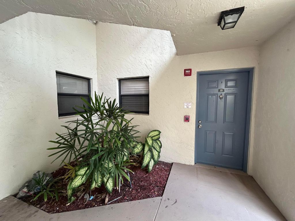 Photo of 1525 Lake Crystal Drive #D, West Palm Beach, FL 33411 (MLS # R11131772)