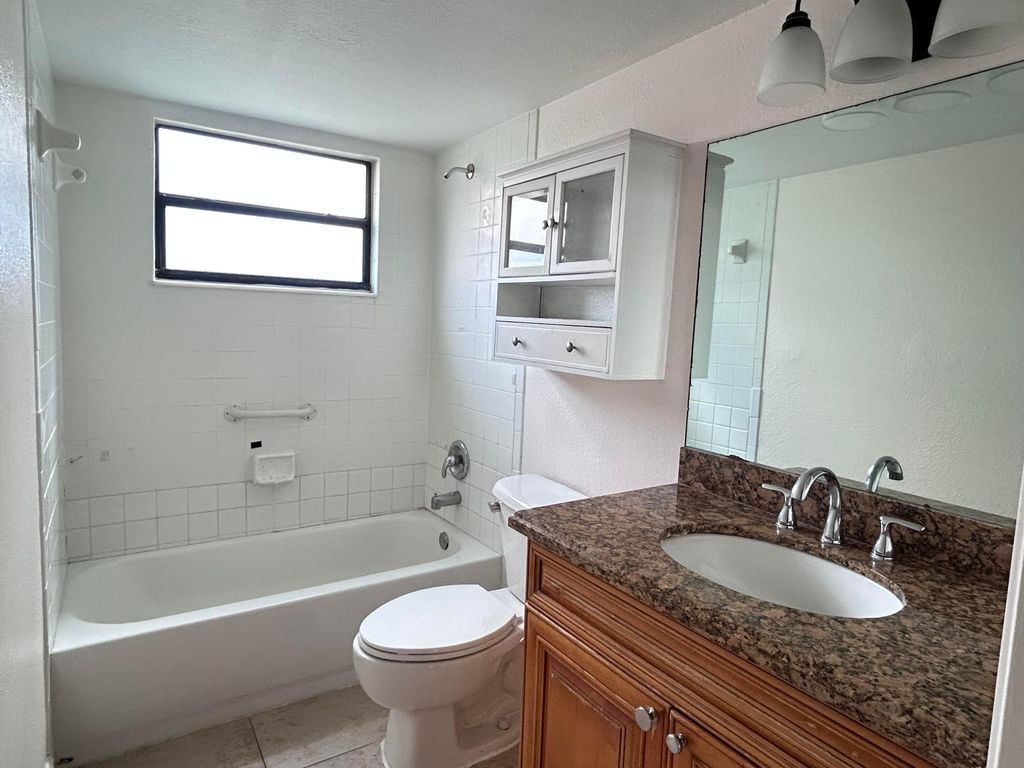 Photo of 1525 Lake Crystal Drive #D, West Palm Beach, FL 33411 (MLS # R11131772)