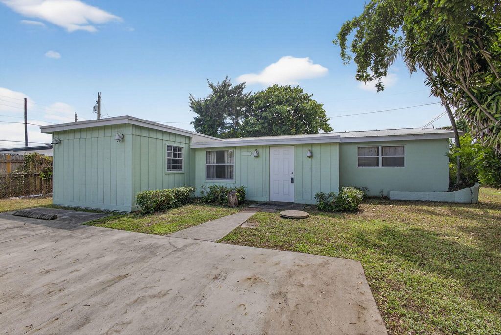 Photo of 5028 Cheryl Lane, West Palm Beach, FL 33415 (MLS # R11126597)