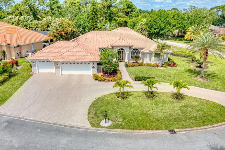 Welcome to 8055 Kiawah Trace, a beautifully maintained home nestled in the desirable PGA Village community of Port St. Lucie. This inviting residence offers a perfect blend of comfort, style, and Florida charm. From the moment you arrive, you'll be captivated by the manicured landscaping and elegant curb appeal.Step inside to find a spacious open-concept floor plan, ideal for both relaxing and entertaining. The living area features abundant natural light and seamless flow into the dining and kitchen spaces. The kitchen is a chef's delight, complete with modern appliances, ample cabinetry, and a breakfast bar for casual meals. Enjoy a peaceful retreat in the primary suite, which boasts a walk-in closet and a well-appointed en-suite bath. Additional bedrooms provide flexibility for