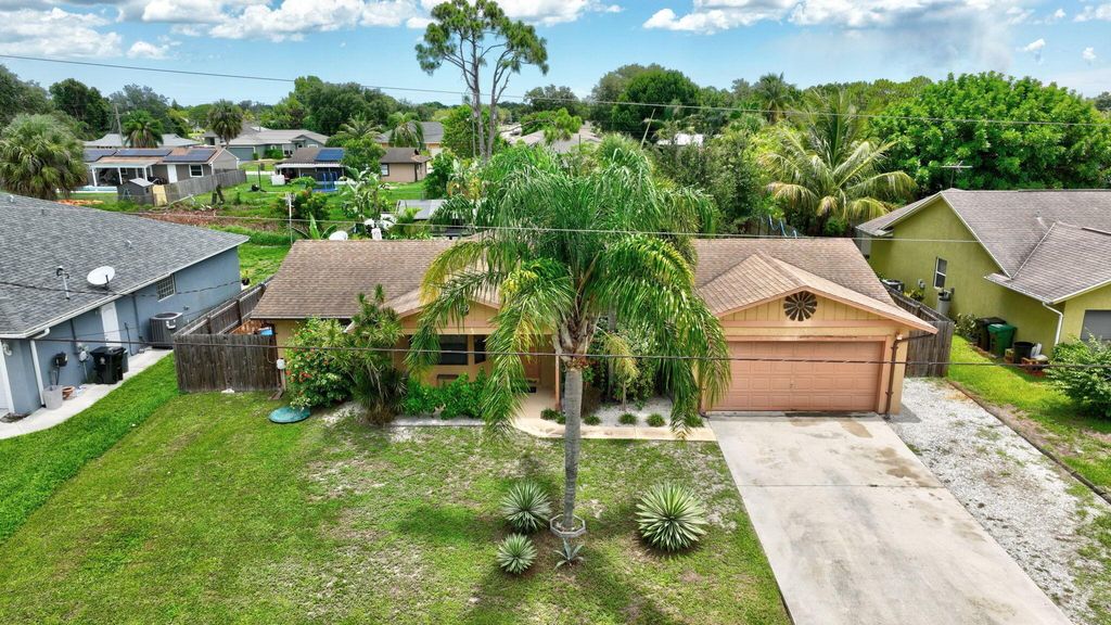 Photo of 2041 SW Susset Lane, Port Saint Lucie, FL 34953 (MLS # R11000029)