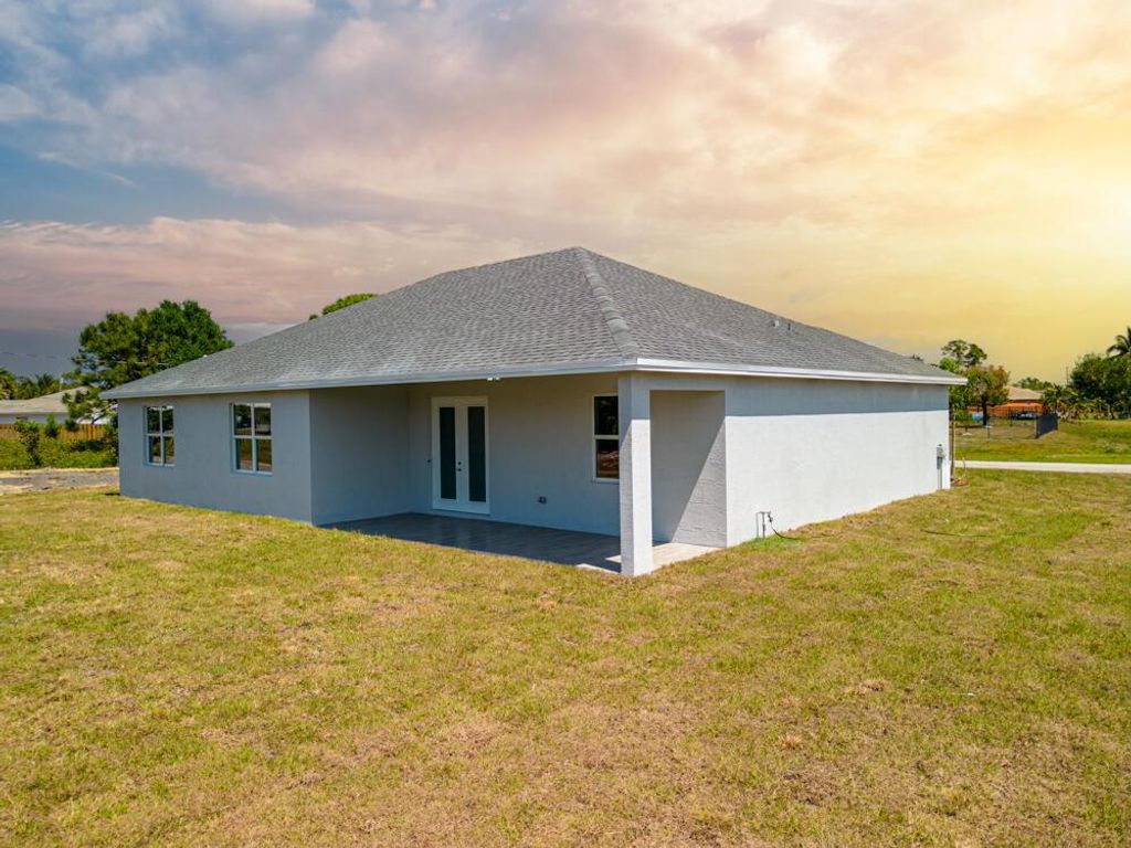 Photo of 262 NW Biltmore Street, Port Saint Lucie, FL 34984 (MLS # R10938301)