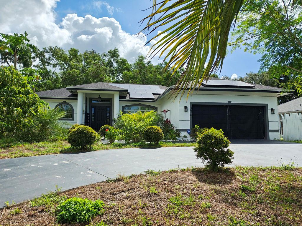 Photo of 376 SW Tulip Boulevard, Port Saint Lucie, FL 34953 (MLS # R11093854)