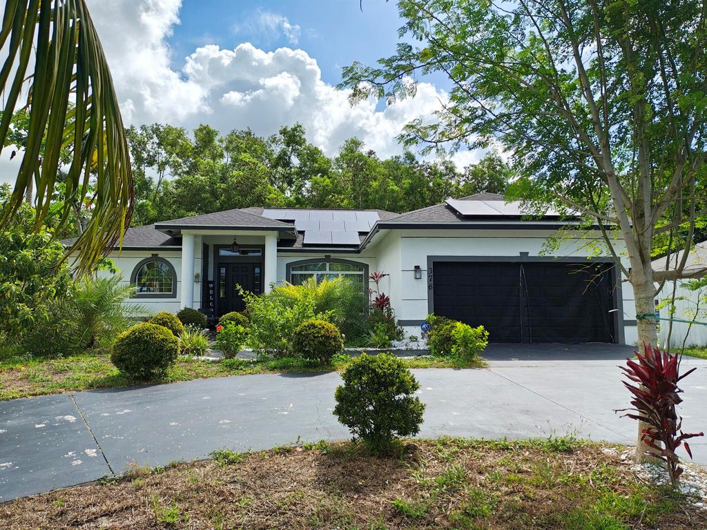 Photo of 376 SW Tulip Boulevard, Port Saint Lucie, FL 34953 (MLS # R11093854)