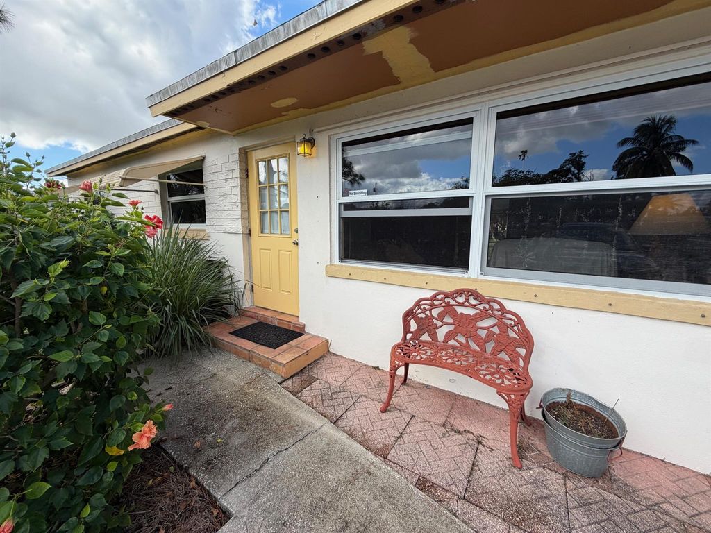 Photo of 813 Burch Drive, West Palm Beach, FL 33415 (MLS # R11146730)