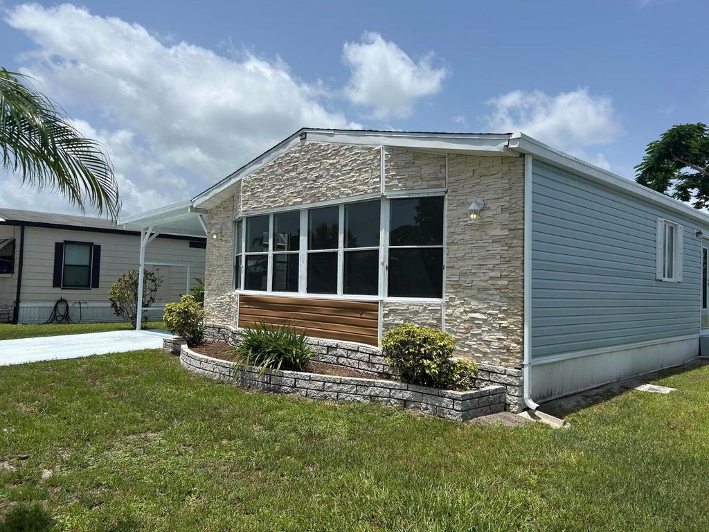 Photo of 3 Flores Del Norte, Fort Pierce, FL 34951 (MLS # R11104817)