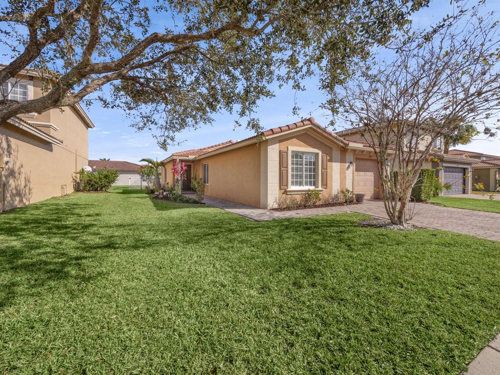 Photo of 2913 SW Cape Breton Drive, Port Saint Lucie, FL 34953 (MLS # R10948356)