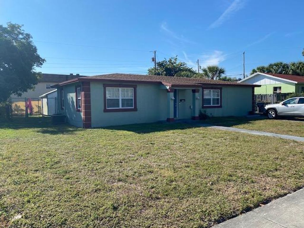 Photo of 930 Foresteria Drive, Lake Park, FL 33403 (MLS # R10685168)