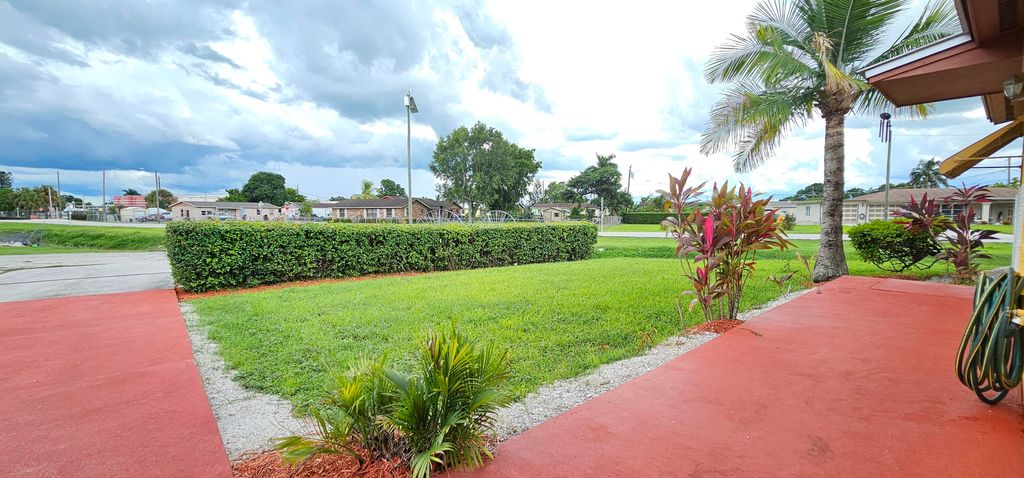 Photo of 632 SW 13th Street, Belle Glade, FL 33430 (MLS # R11126683)