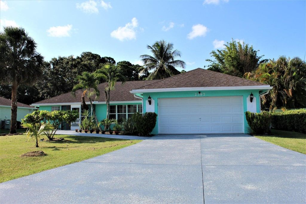 Photo of 2397 SE Gillette Avenue, Port Saint Lucie, FL 34952 (MLS # R11001275)